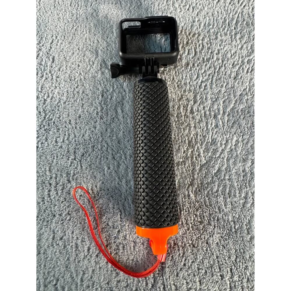 Floating hand grip accessory designed for action cameras, GoPro The Handle